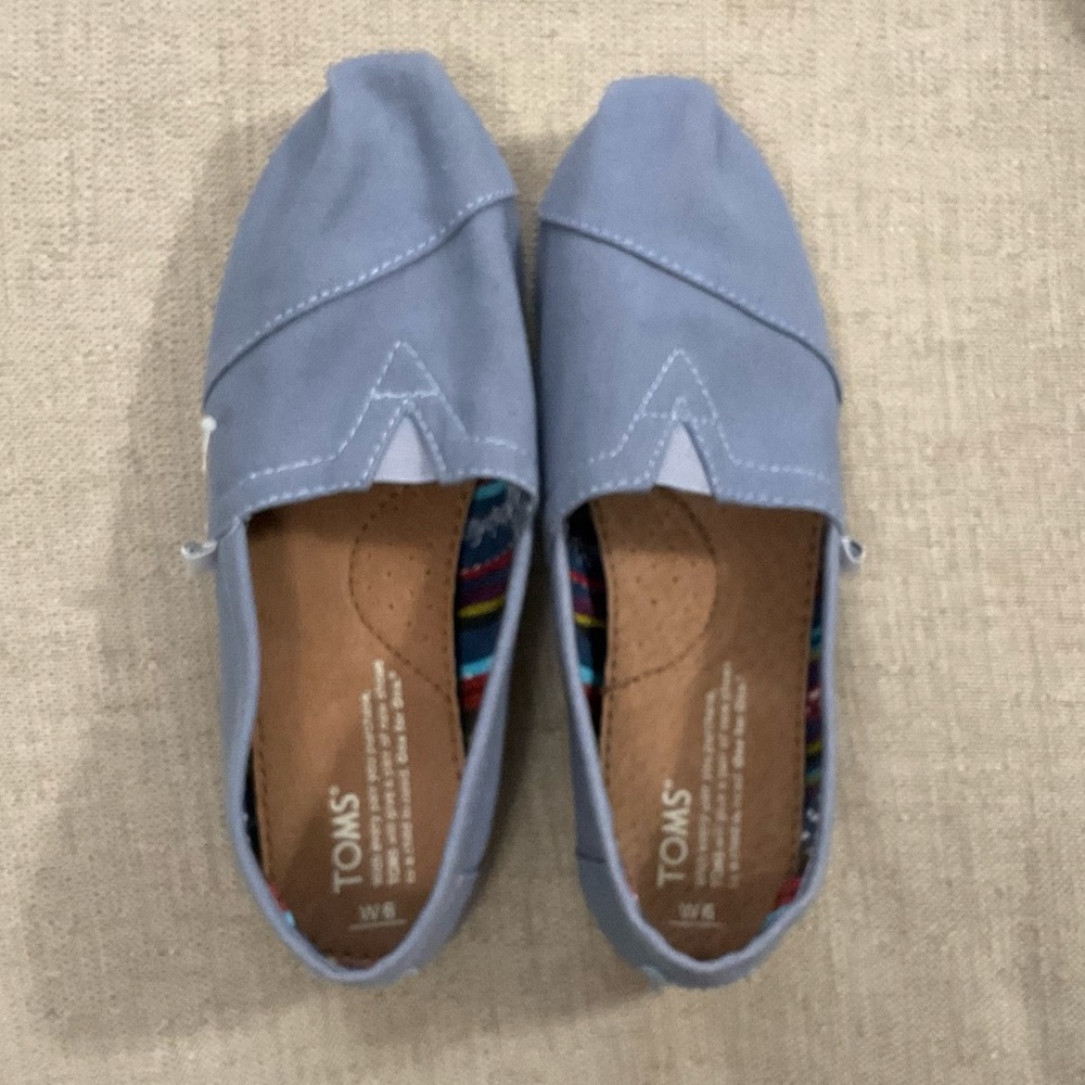Tom’s Blue Canvas Slip-on Shoes